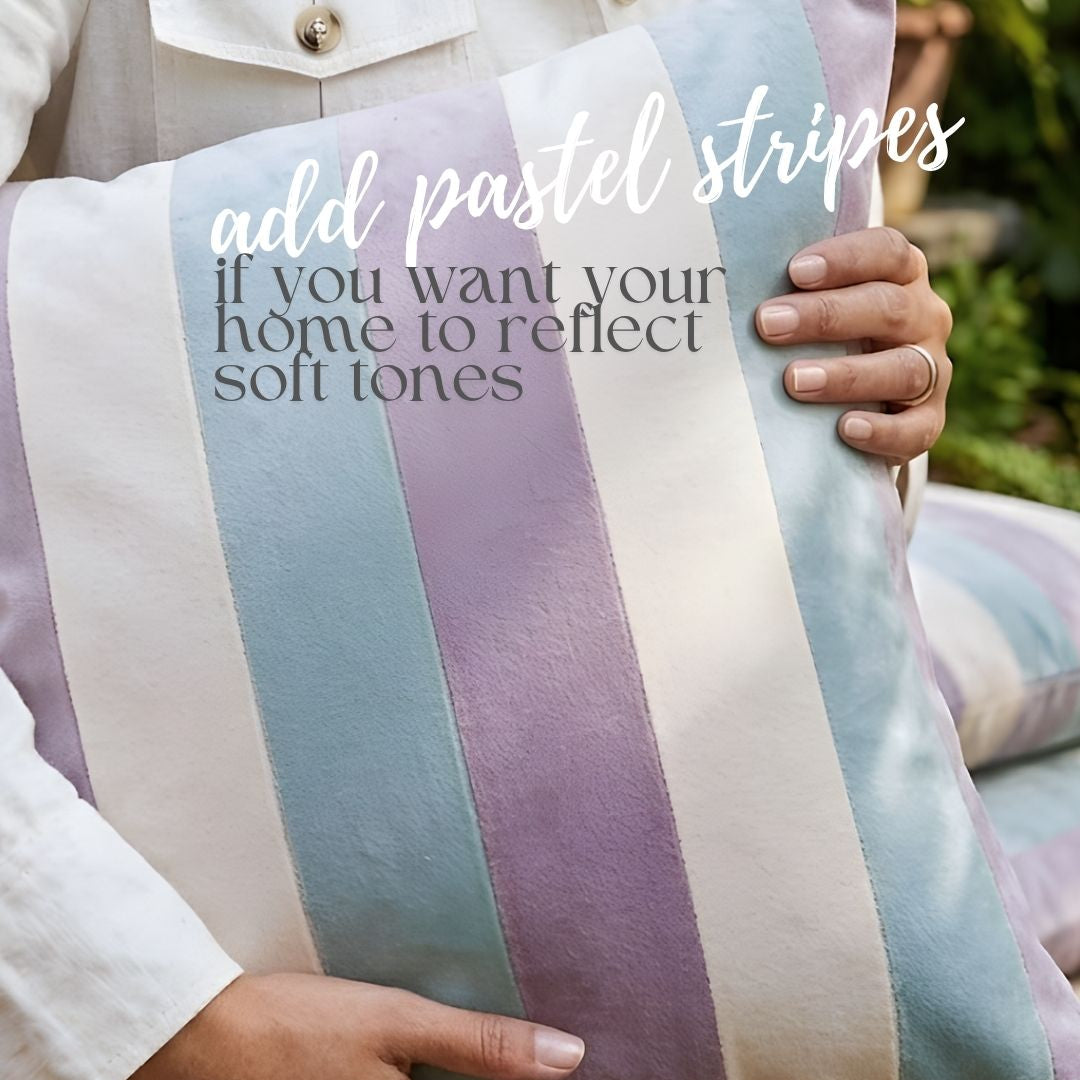 Person holding a pastel striped pillow with text overlay