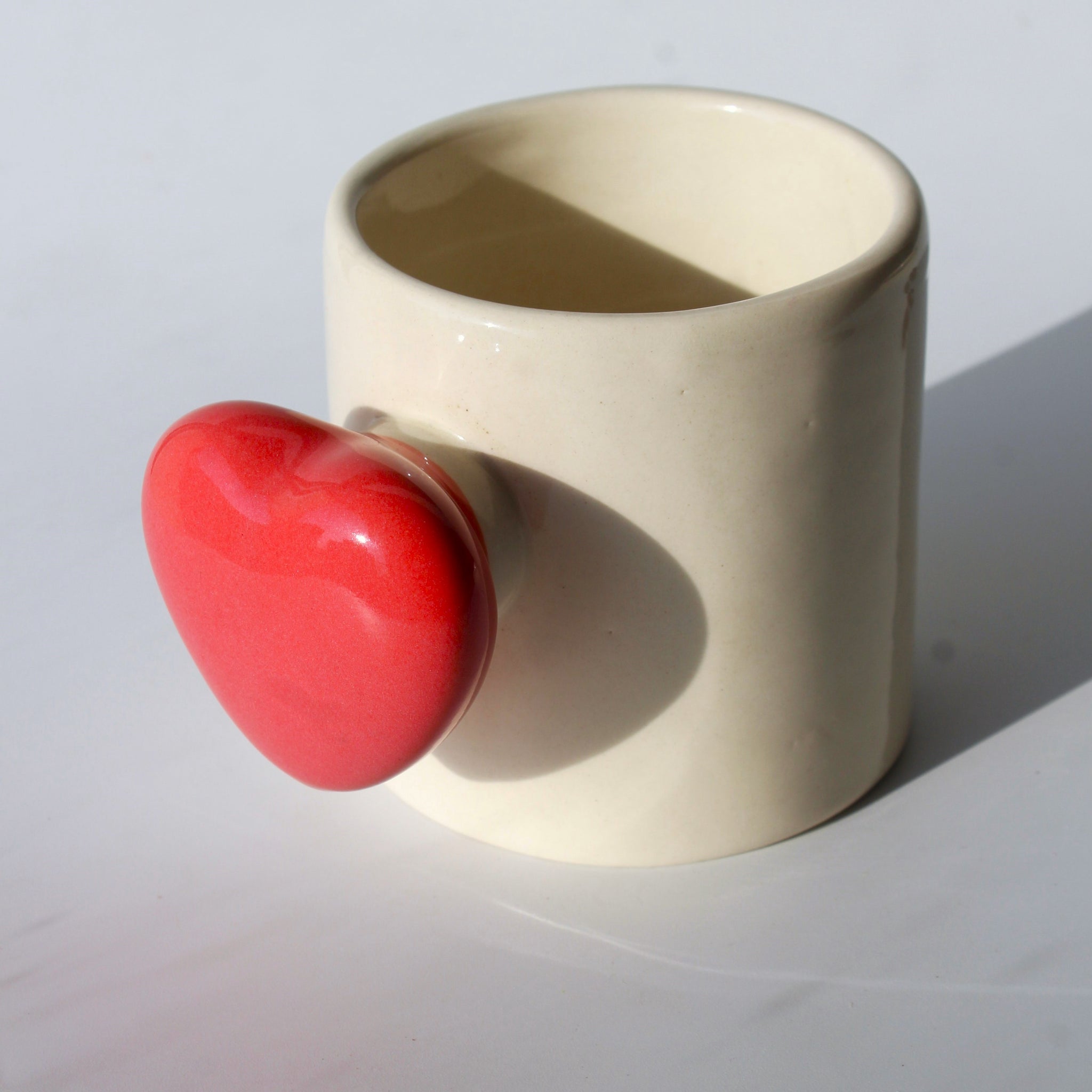 Heart shaped handle microwave safe ceramic mug