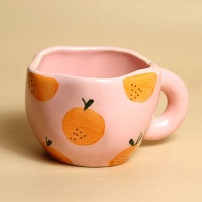 Fiesta pink orange cup and saucer detail - del hogar