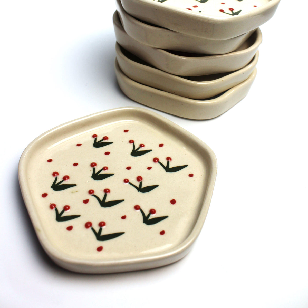 Bud ceramic dessert plates close up - del hogar